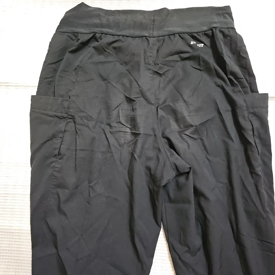 Pantalones de entrenamiento negros Nike Dry Fit Pantalones largos para mujer