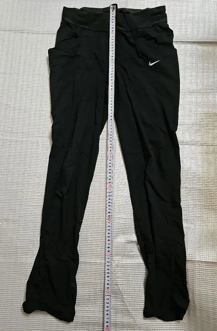 Pantalones de entrenamiento negros Nike Dry Fit Pantalones largos para mujer