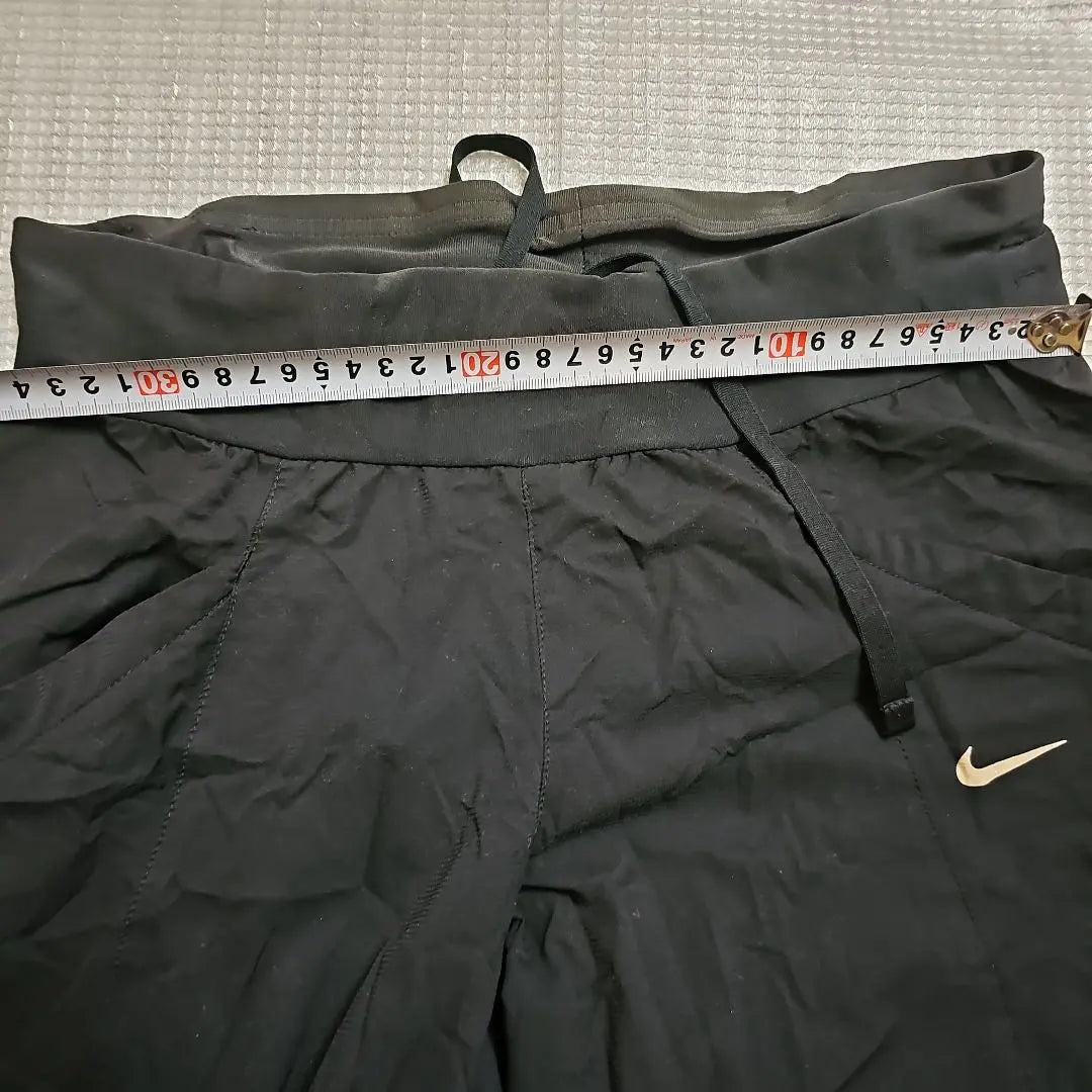 Pantalones de entrenamiento negros Nike Dry Fit Pantalones largos para mujer