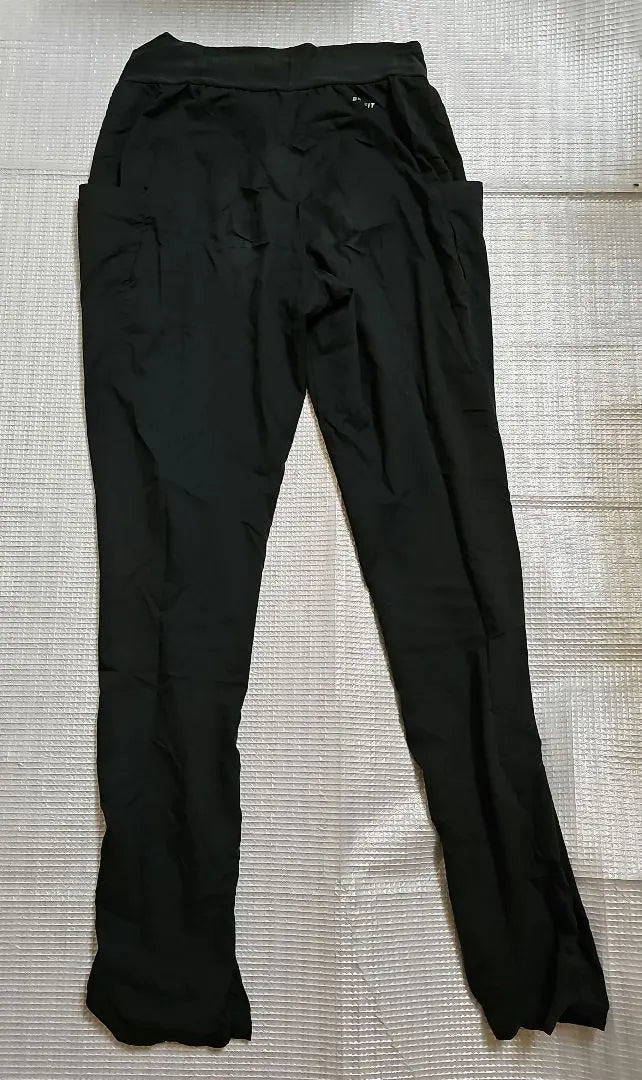 Pantalones de entrenamiento negros Nike Dry Fit Pantalones largos para mujer