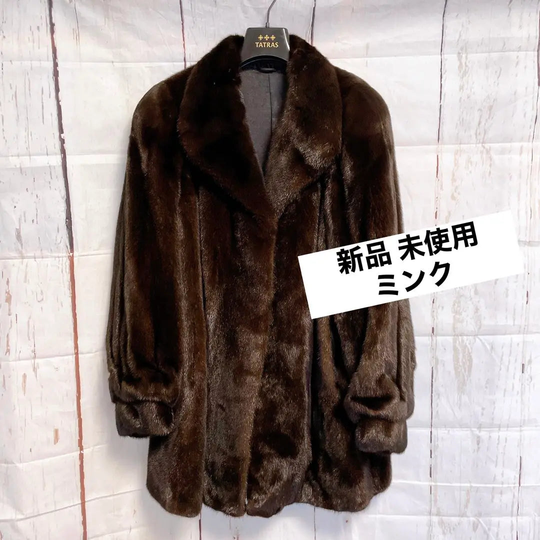 Brand new, unused BLACK GLAMA mink fur coat