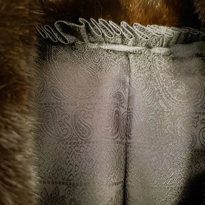 Brand new, unused BLACK GLAMA mink fur coat