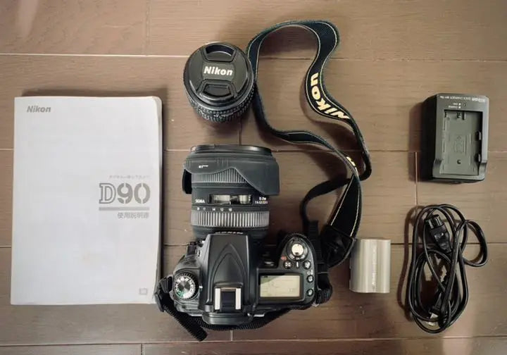 Nikon D90 SLR, 2 lenses, 2 genuine batteries, genuine charger