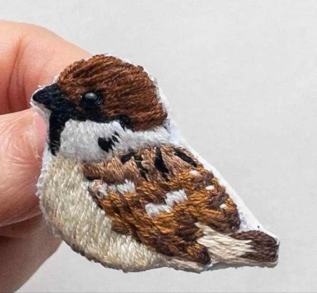 Handmade embroidered brooch sparrow