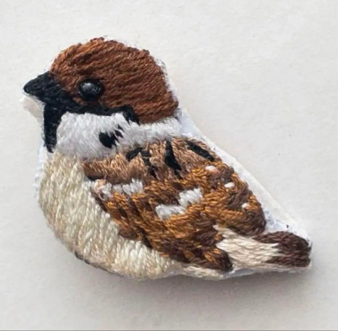 Handmade embroidered brooch sparrow