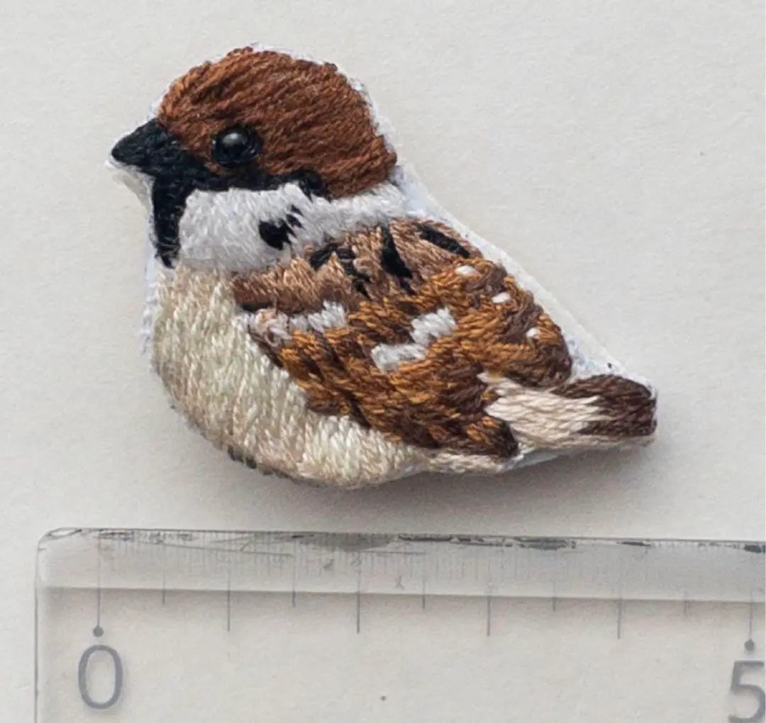 Handmade embroidered brooch sparrow