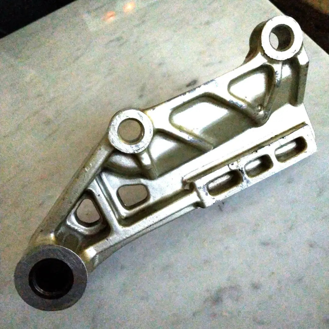 RZ250R Rear Caliper Support