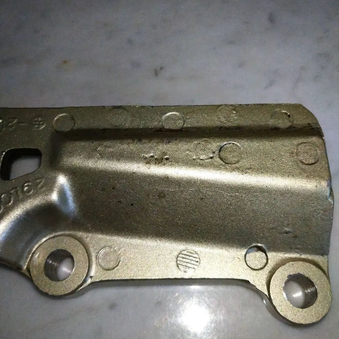 RZ250R Rear Caliper Support