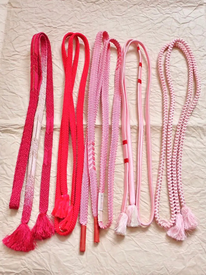 I'll hand over 5 nice pink obi strings.