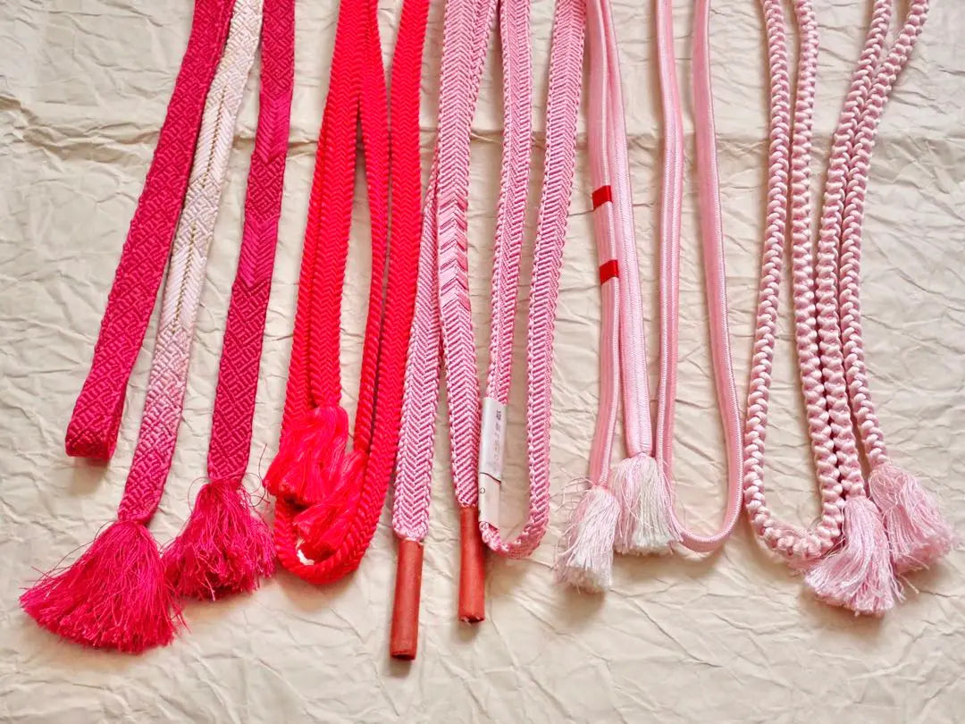 I'll hand over 5 nice pink obi strings.