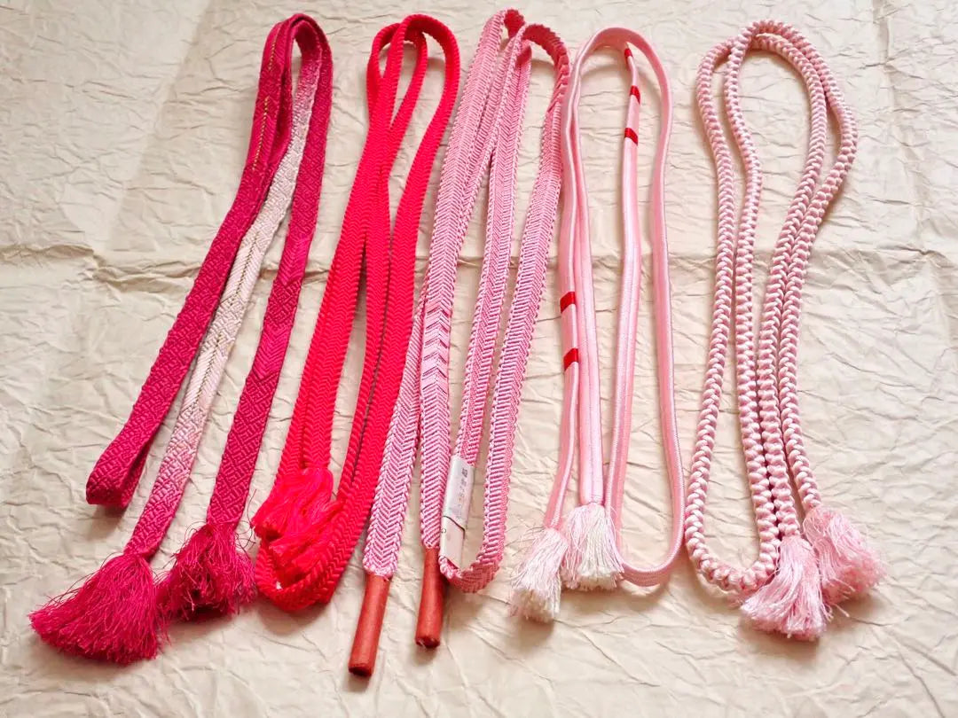 I'll hand over 5 nice pink obi strings.