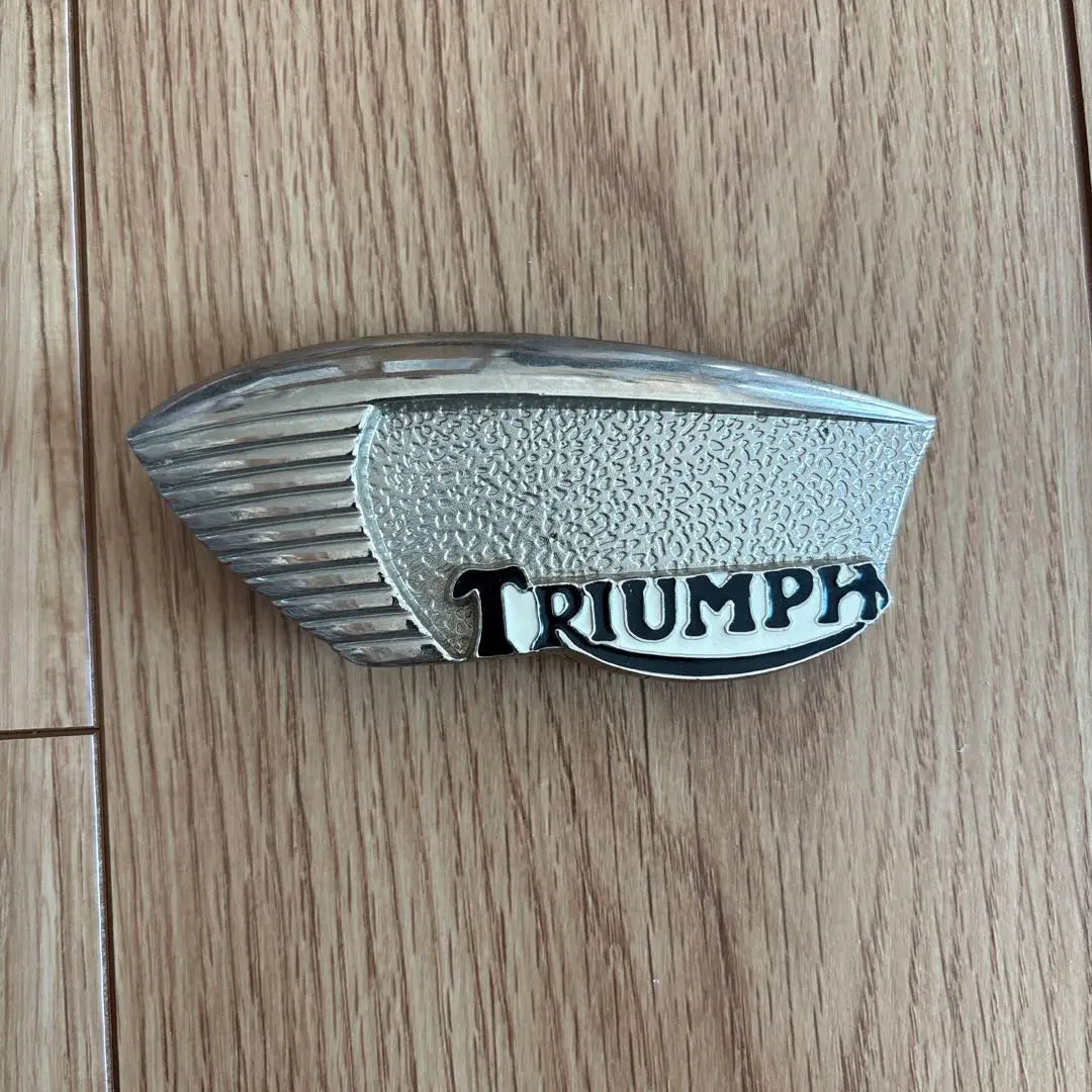 Triumph buckle, vintage unused