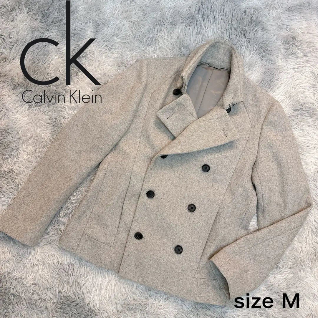 Abrigo Calvin Klein talla M gris