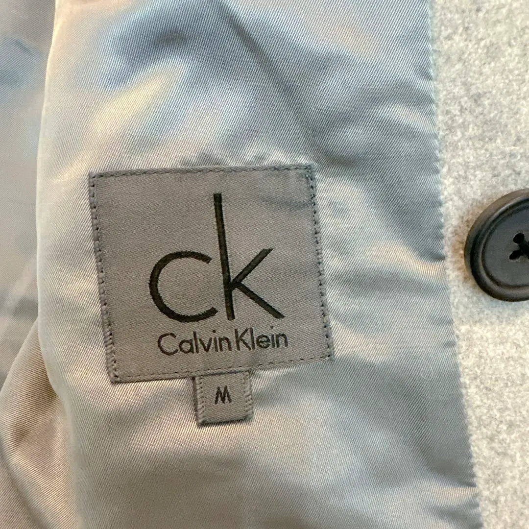 Abrigo Calvin Klein talla M gris