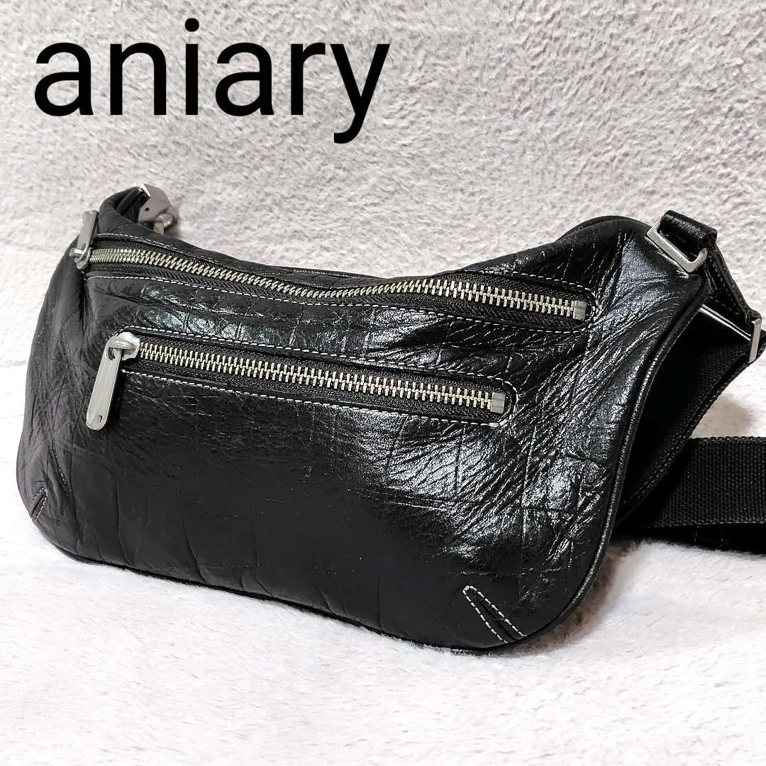 Aniari waist bag black leather embossed crossbody simple