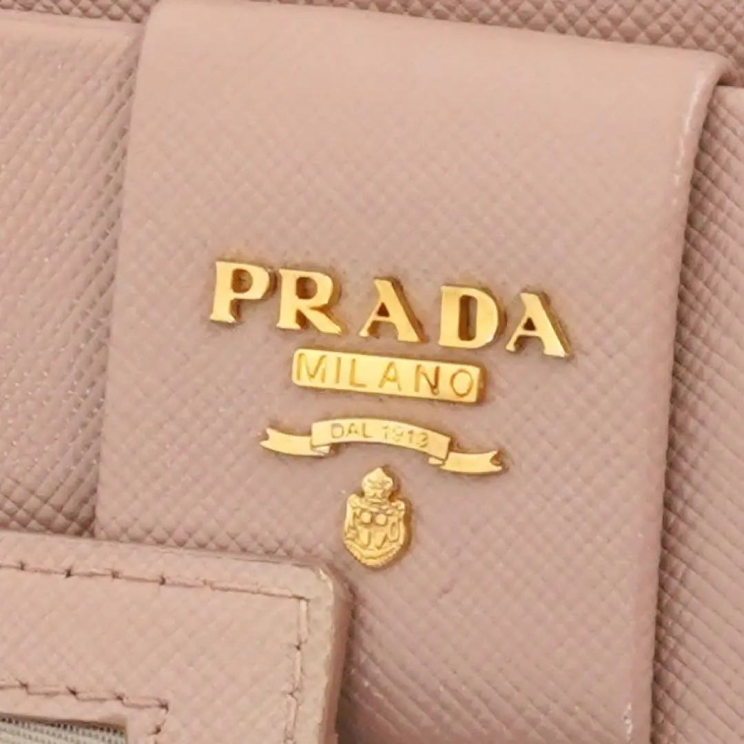 ✨It's almost unused, with box warranty ✨ Prada long wallet Saffiano leather metal logo