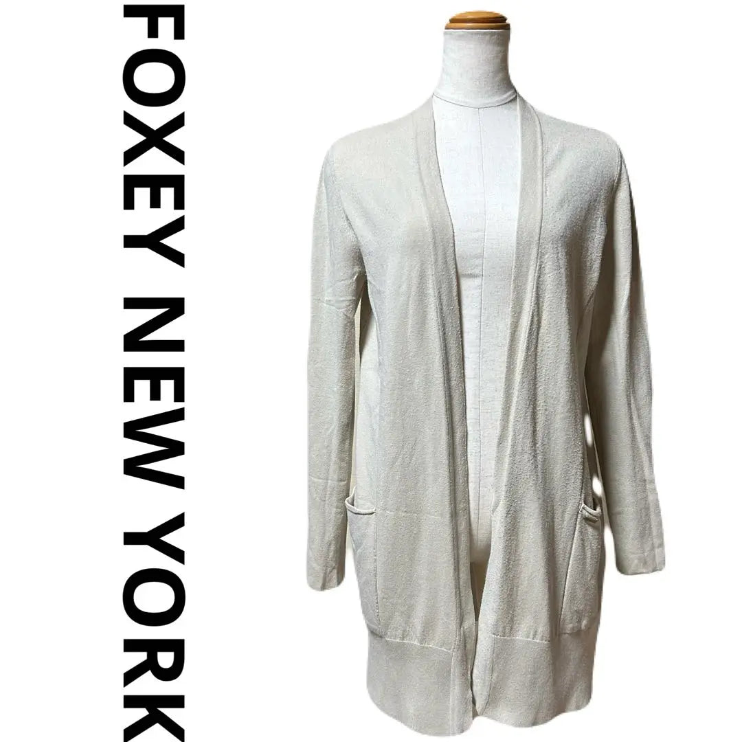 Translated by FoxeyNewYork Foxy NewYork Middle-length cardigan