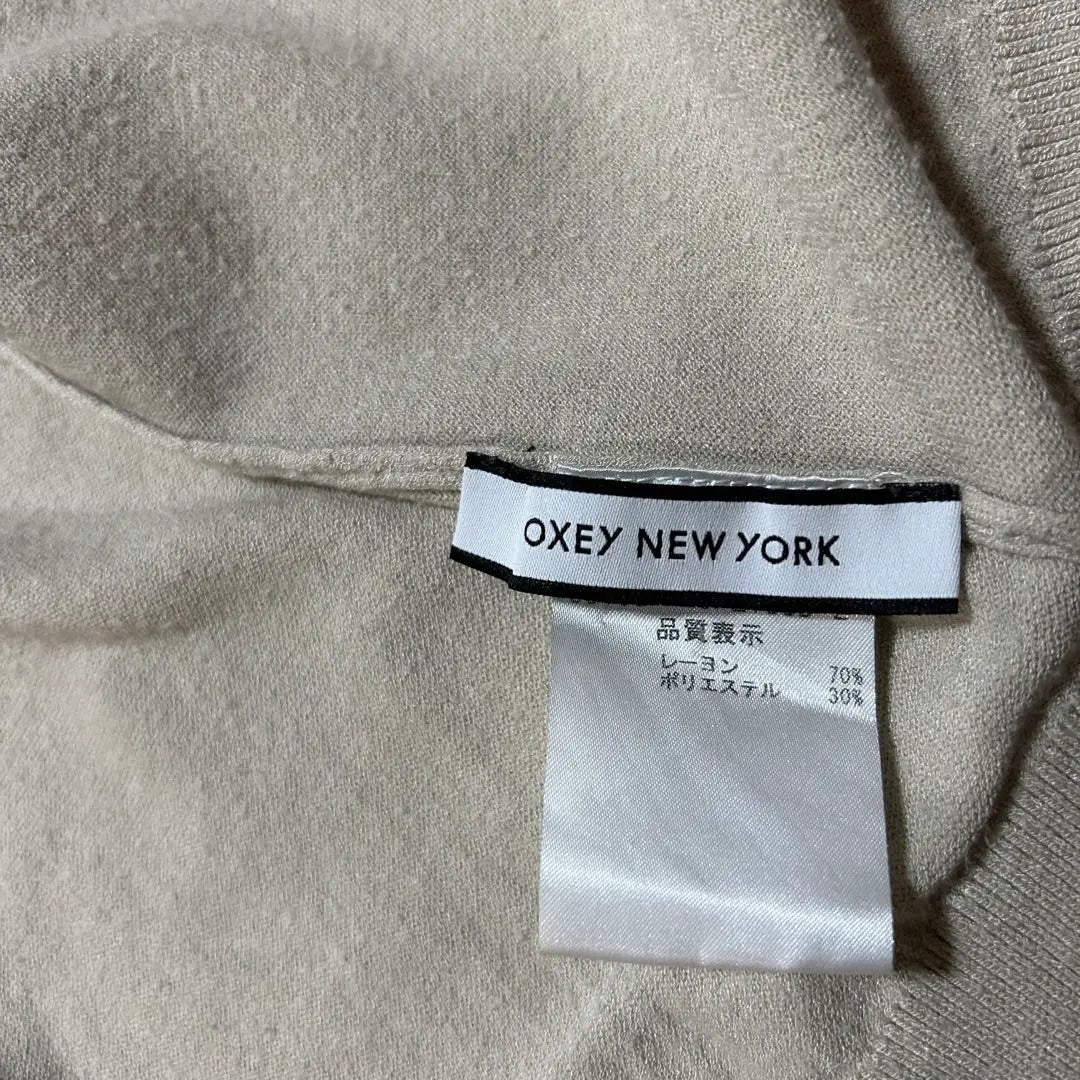 Translated by FoxeyNewYork Foxy NewYork Middle-length cardigan