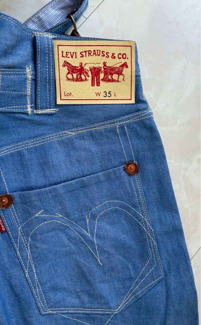 Pantalones vaqueros con tirantes y nombre de JUNYA WATANABE en buenas condiciones