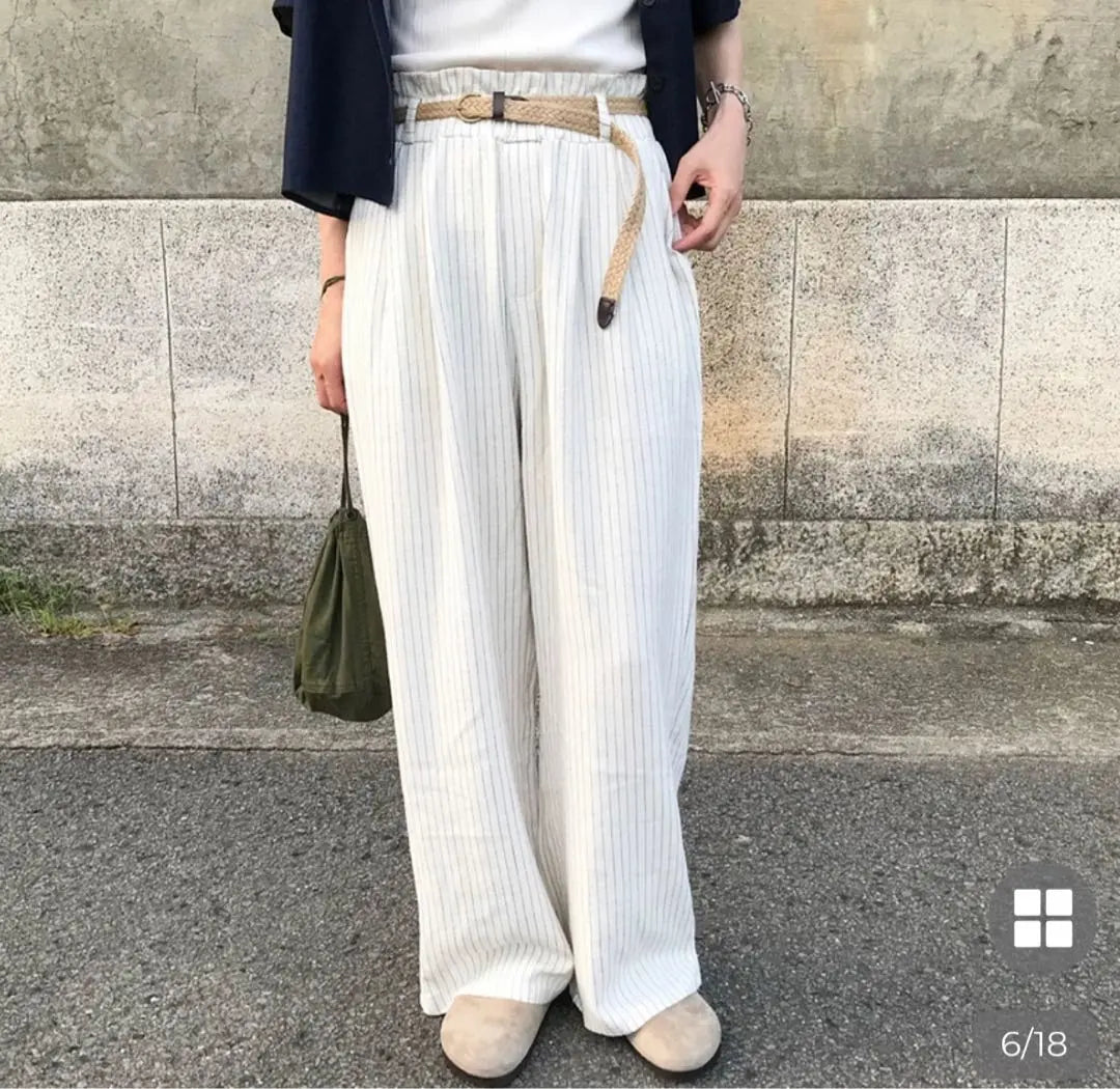 Nugu klee striped pattern belted pants