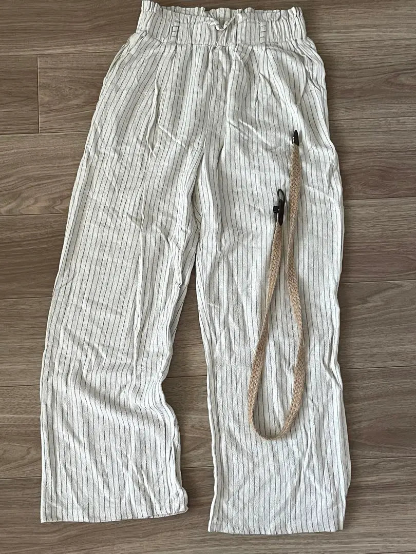 Nugu klee striped pattern belted pants