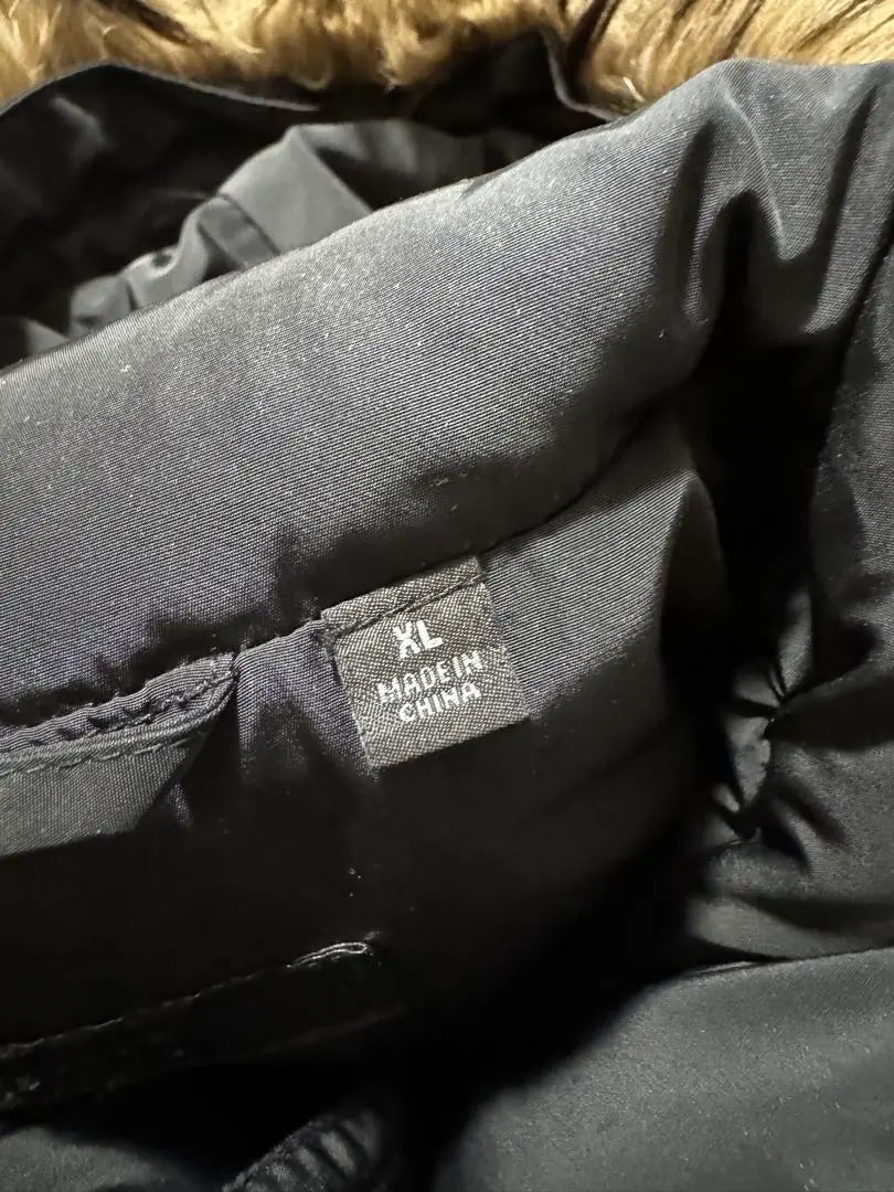 Chaqueta de plumón negra UNIQLO con cinturón de cintura larga de piel | Productos UNIQLO