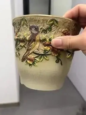 Decorative ceramic flower pots with flowers and birds