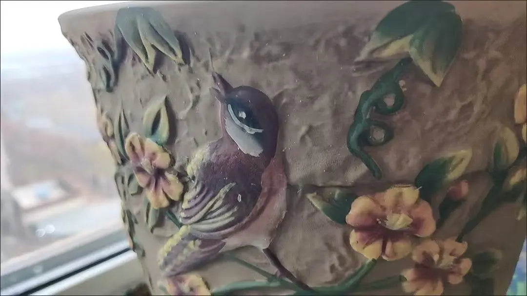 Decorative ceramic flower pots with flowers and birds