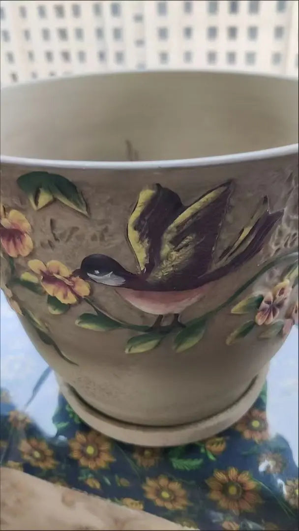 Decorative ceramic flower pots with flowers and birds