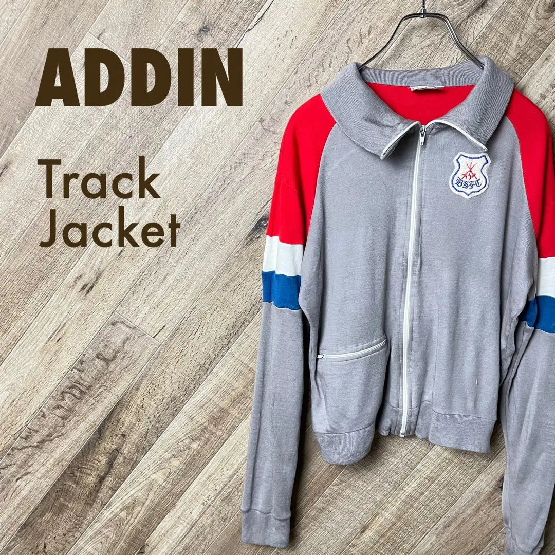 Chaqueta deportiva multicolor de los años 80 con parche de jersey gris de longitud corta