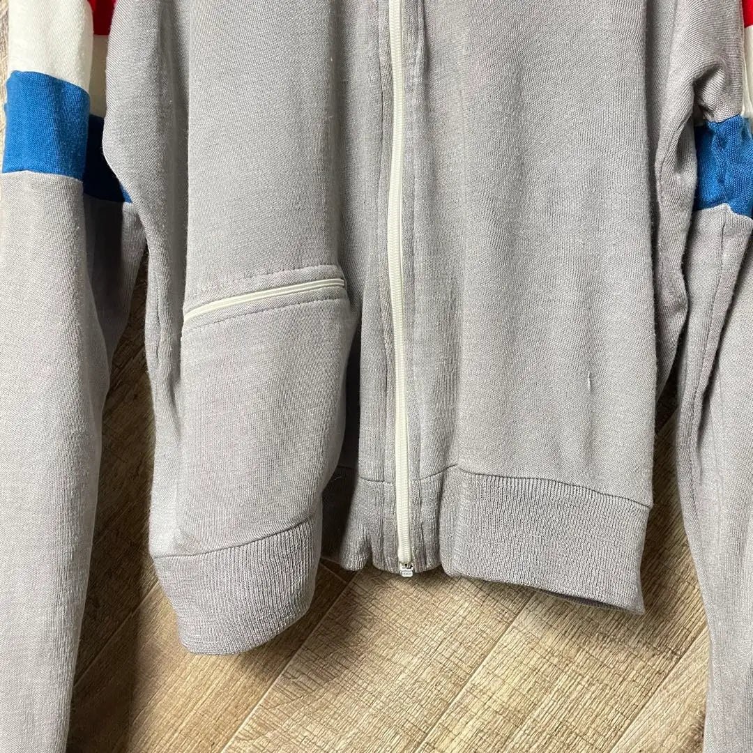 Chaqueta deportiva multicolor de los años 80 con parche de jersey gris de longitud corta