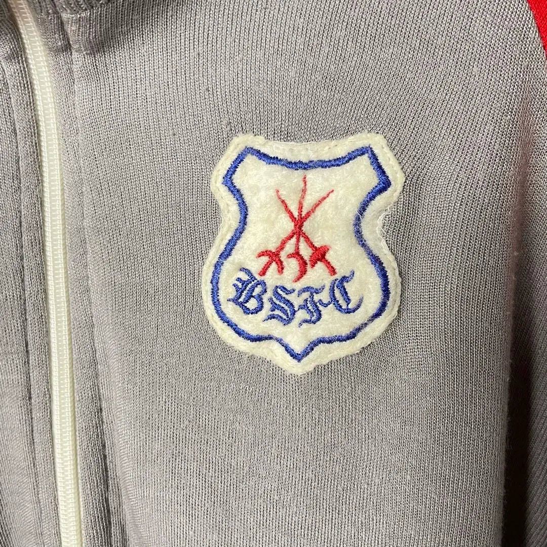 Chaqueta deportiva multicolor de los años 80 con parche de jersey gris de longitud corta