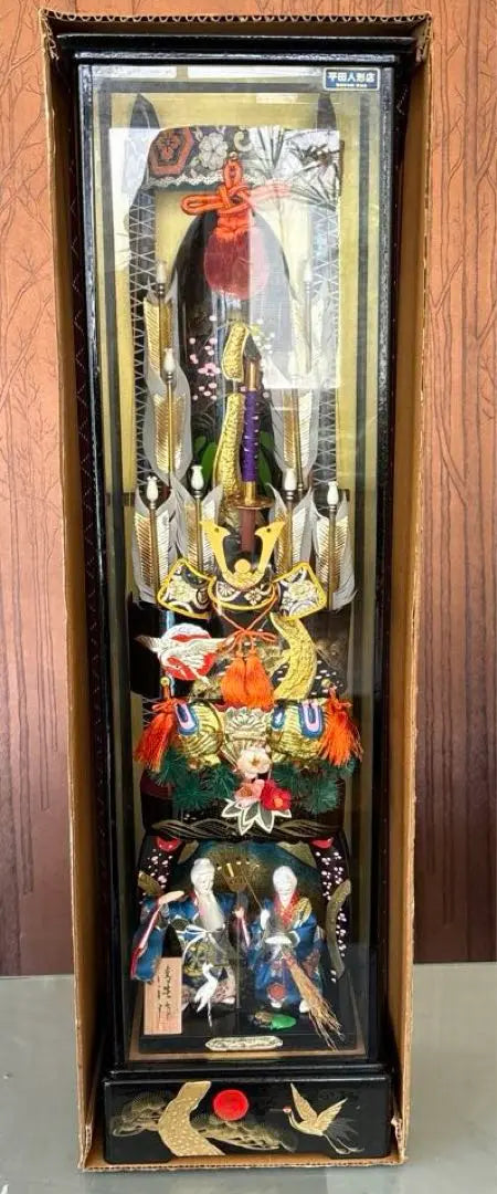 Japanese traditional decorations included in a glass case