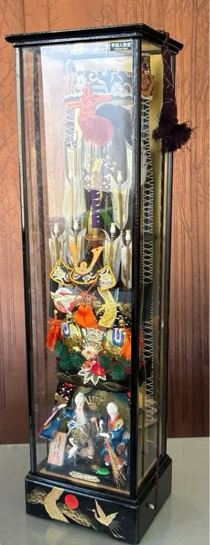 Japanese traditional decorations included in a glass case