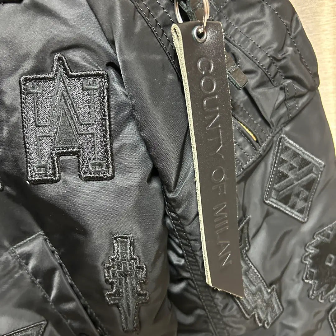 MARCELO BURLON ALPHA patch bomber jacket