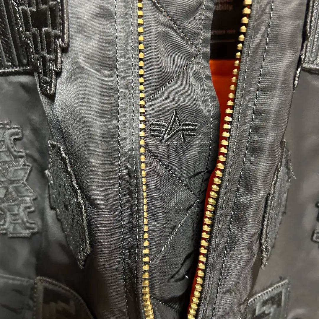 MARCELO BURLON ALPHA patch bomber jacket