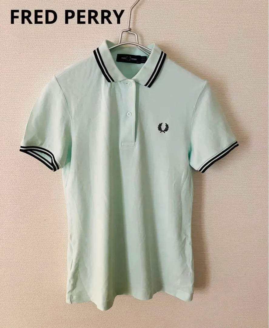 Polo de golf elástico de manga corta Fred Perry en verde menta