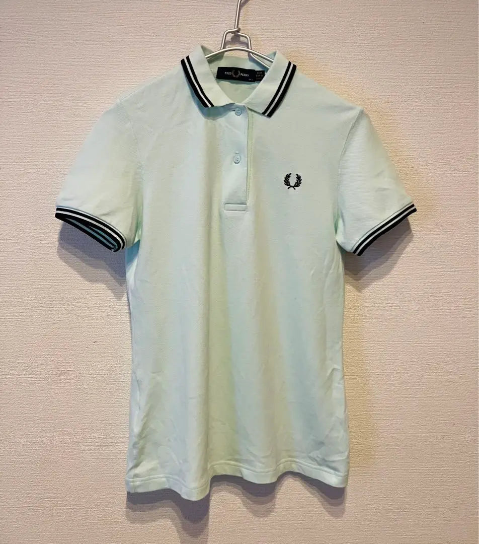 Polo de golf elástico de manga corta Fred Perry en verde menta