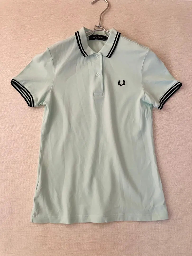 Polo de golf elástico de manga corta Fred Perry en verde menta