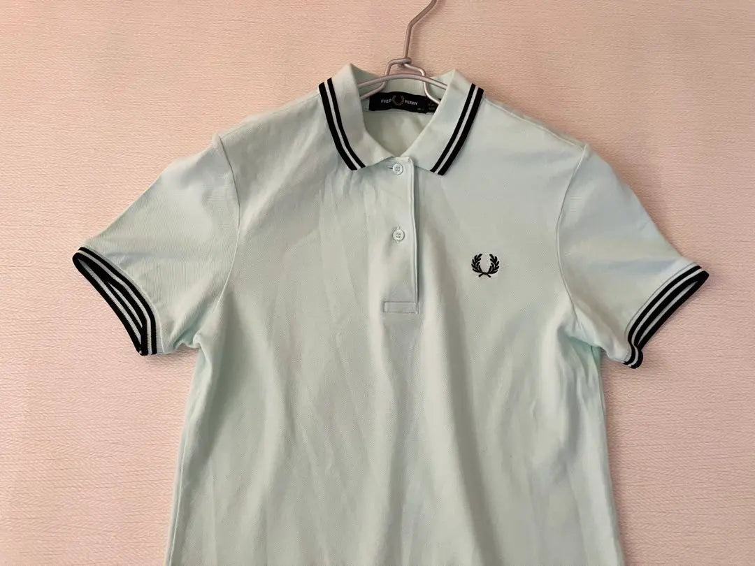 Polo de golf elástico de manga corta Fred Perry en verde menta