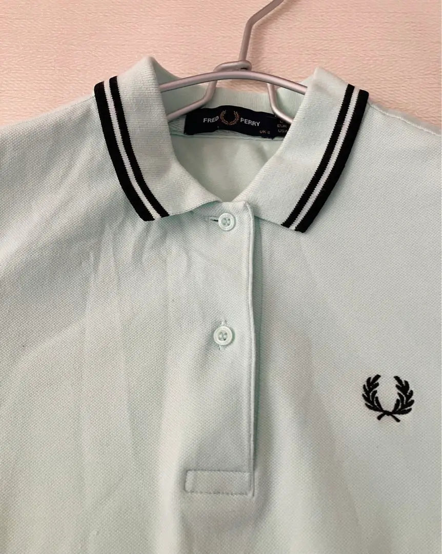 Polo de golf elástico de manga corta Fred Perry en verde menta