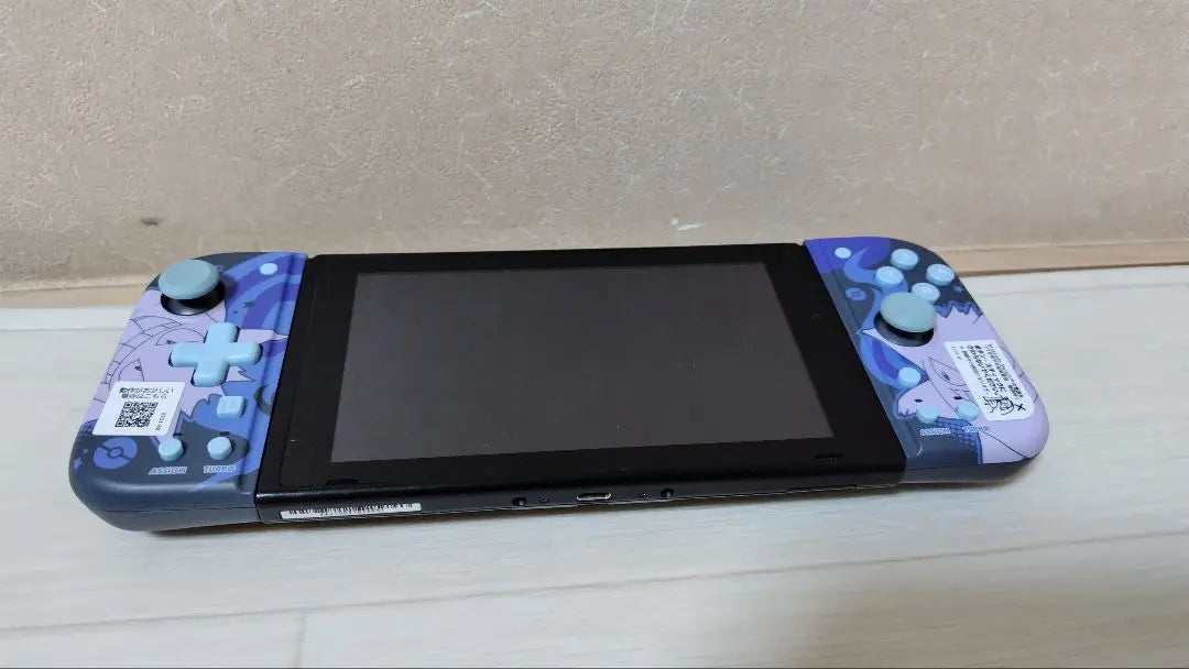 Nintendo Switch and Grip Controller Genger