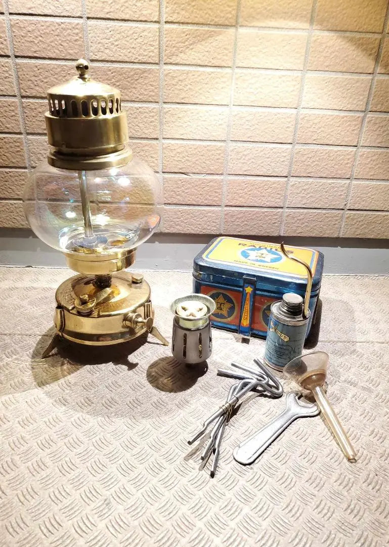 This is the RADIUS lantern model N146. Comes with a burner. Full brass model