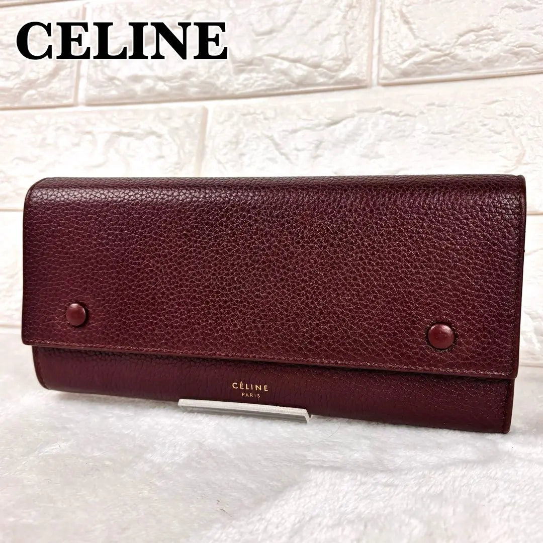 Hermosa cartera larga Celine con solapa multifunción grande color rojo burdeos