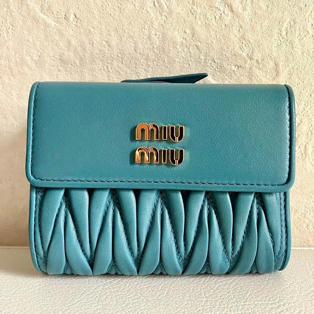 Current model RFID MIUMIU Tri-fold Wallet Matterasse Leather Blue