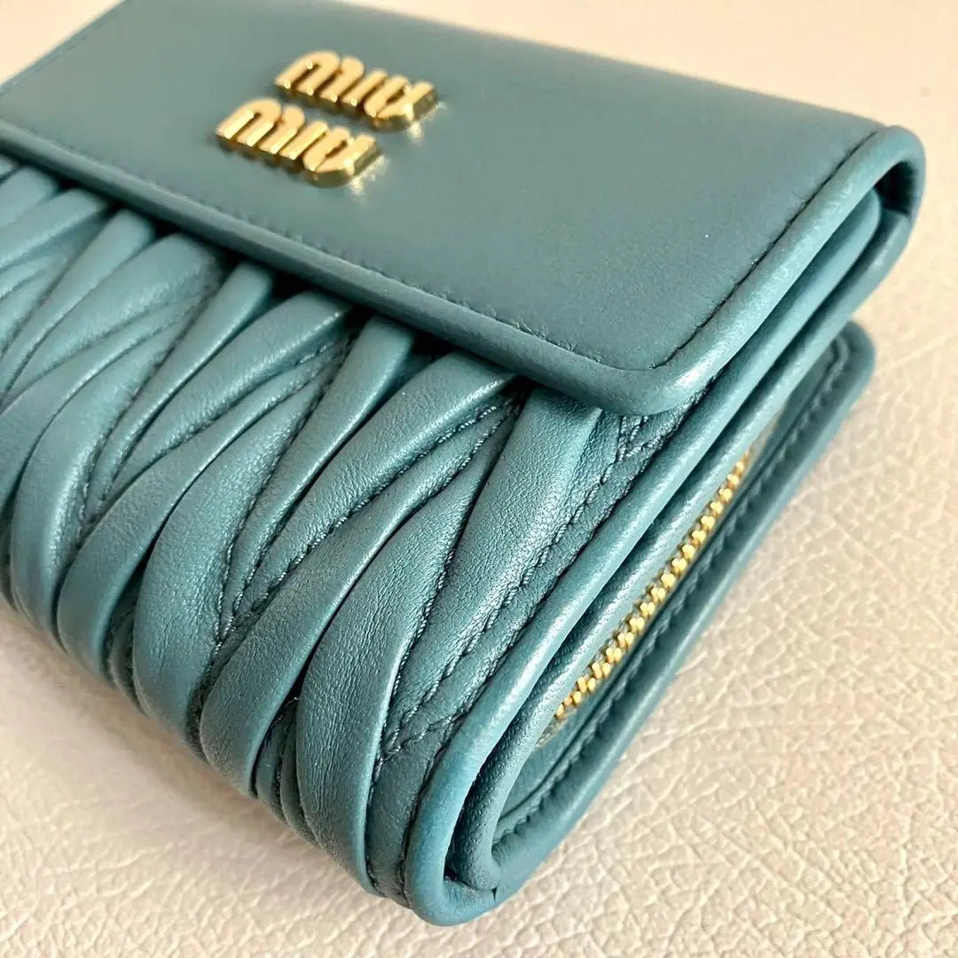 Current model RFID MIUMIU Tri-fold Wallet Matterasse Leather Blue