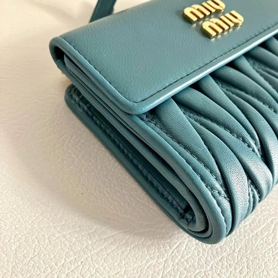 Current model RFID MIUMIU Tri-fold Wallet Matterasse Leather Blue