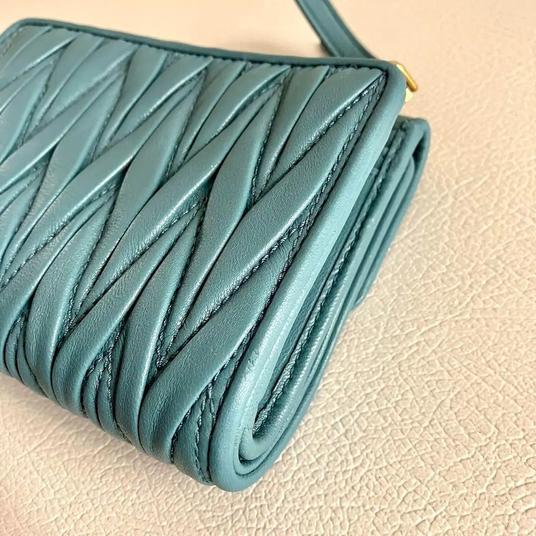 Current model RFID MIUMIU Tri-fold Wallet Matterasse Leather Blue