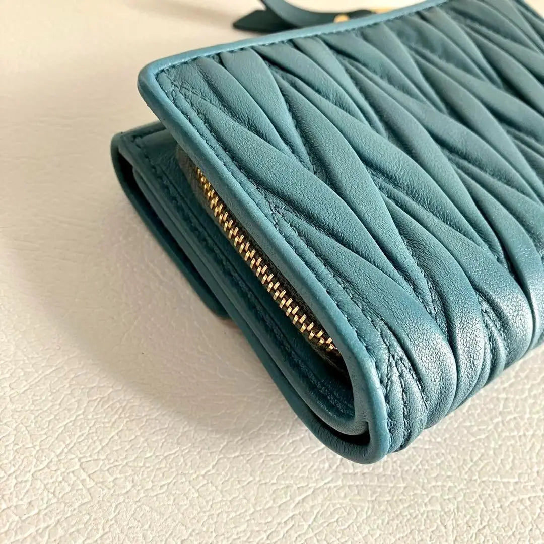 Current model RFID MIUMIU Tri-fold Wallet Matterasse Leather Blue