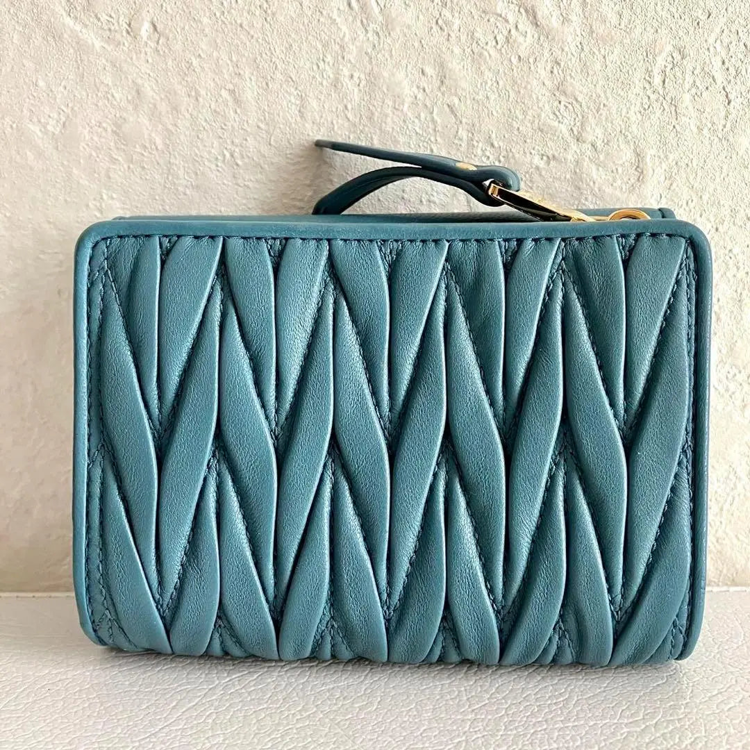 Current model RFID MIUMIU Tri-fold Wallet Matterasse Leather Blue